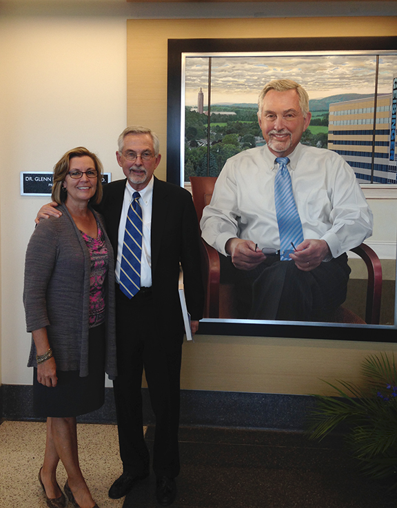 2208 Glenn & Lisa Steele with portrait at the dedication ceremony 150618